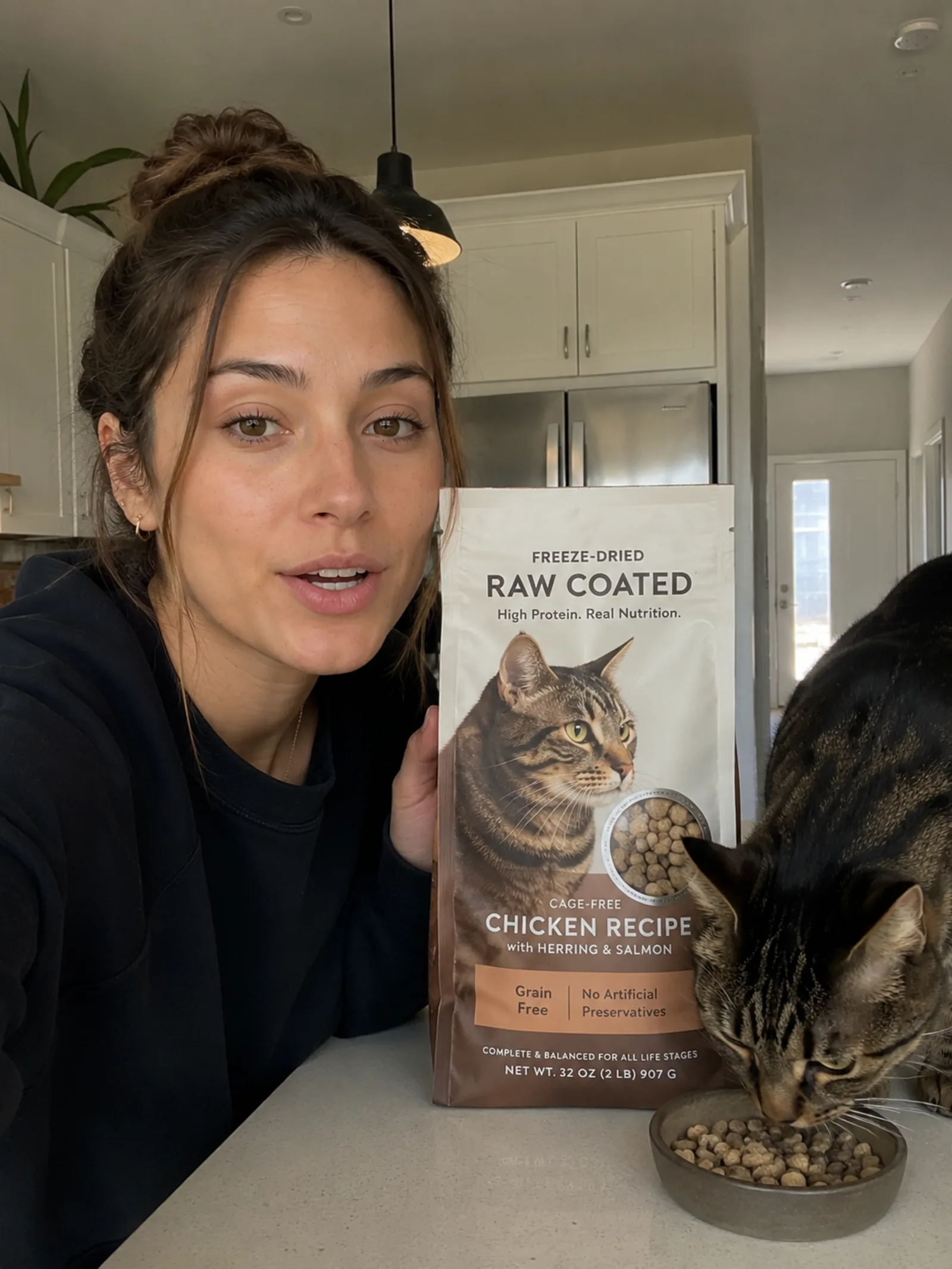 Customer showing a pet product at home